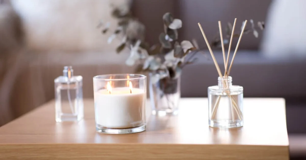 a variety of home fragrances on a table at home