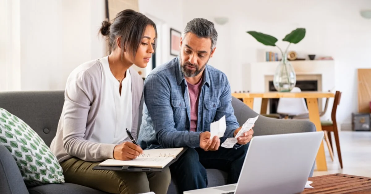 couple calculating household bills