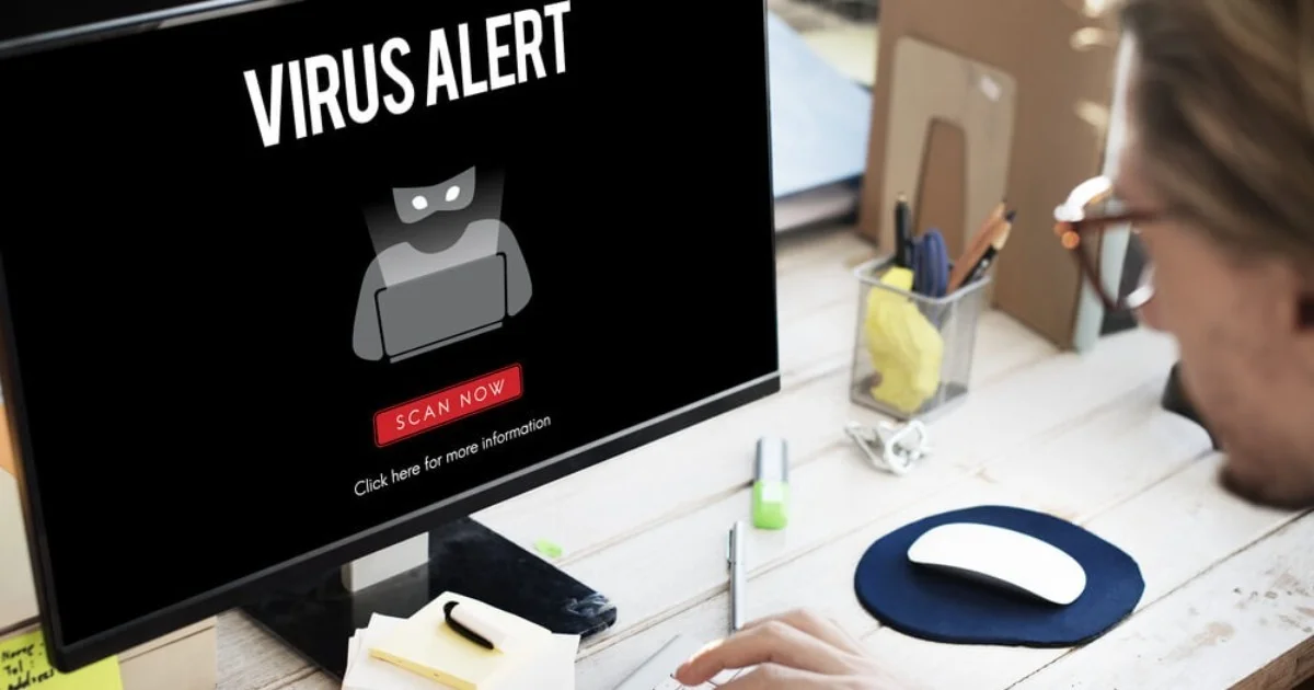 a computer screen showing a virus alert message